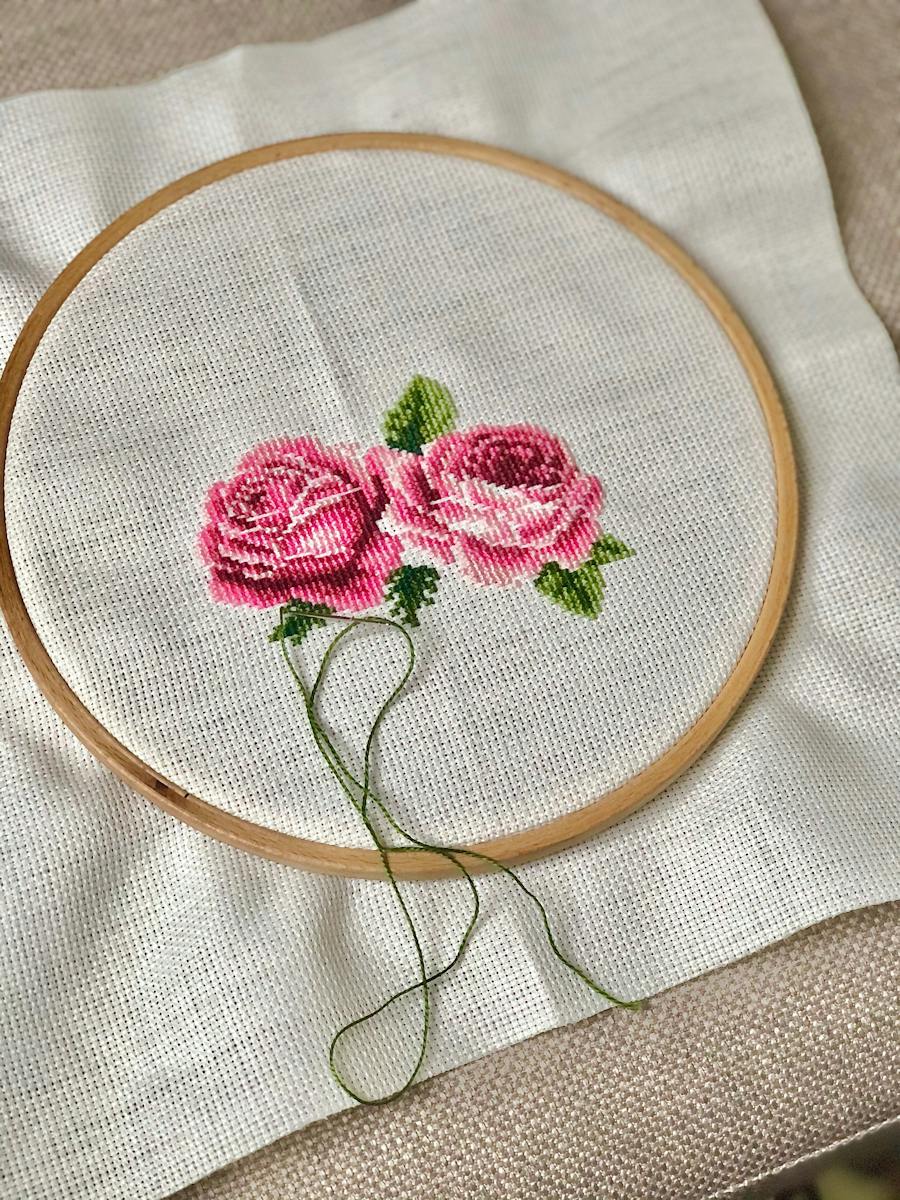 Image of Roses Embroidering on Fabric